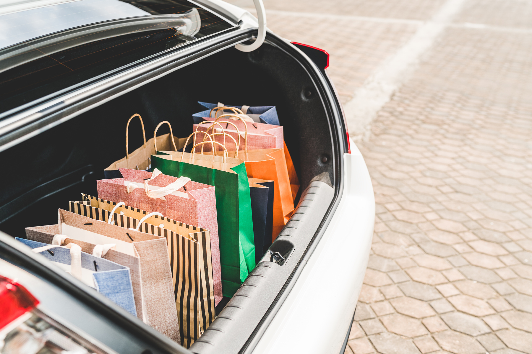 Shopping bags in the truck of a car